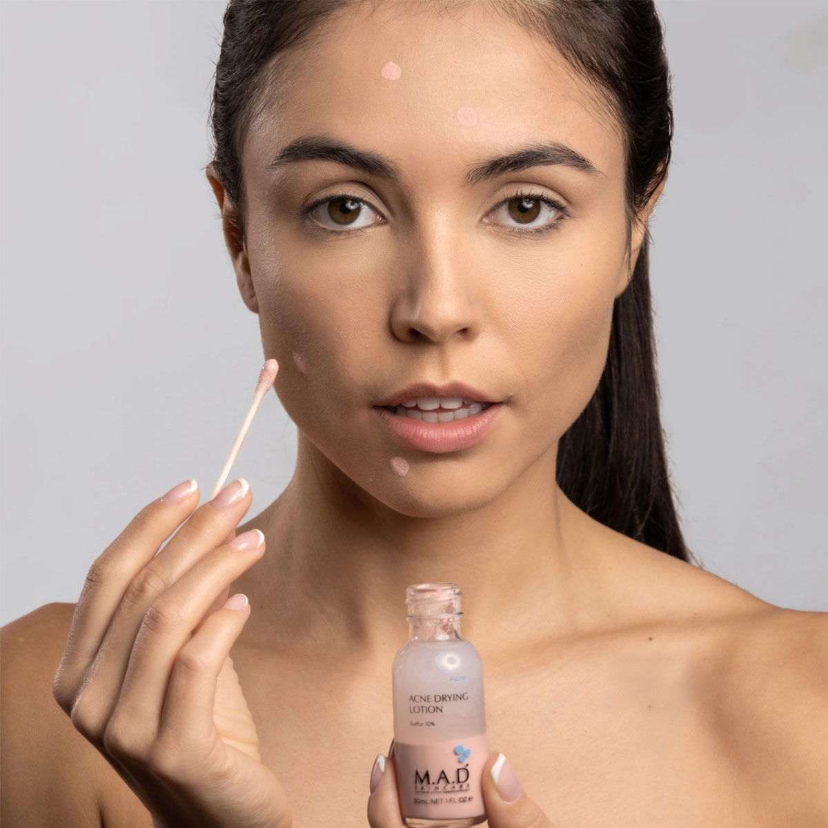 Nanošenje M.A.D Spot On Drying Lotion